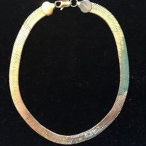 15 1/2 inch gold colored choker style necklace